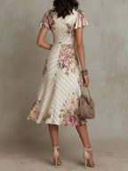 Alba | Robe midi cache-cœur froncée à imprimé floral élégant