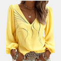 Rozane | Blouse col V bouffante