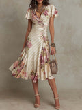 Alba | Robe midi cache-cœur froncée à imprimé floral élégant