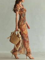 Violette | Robe maxi en mousseline orange à imprimé peinture à l'huile style bohème