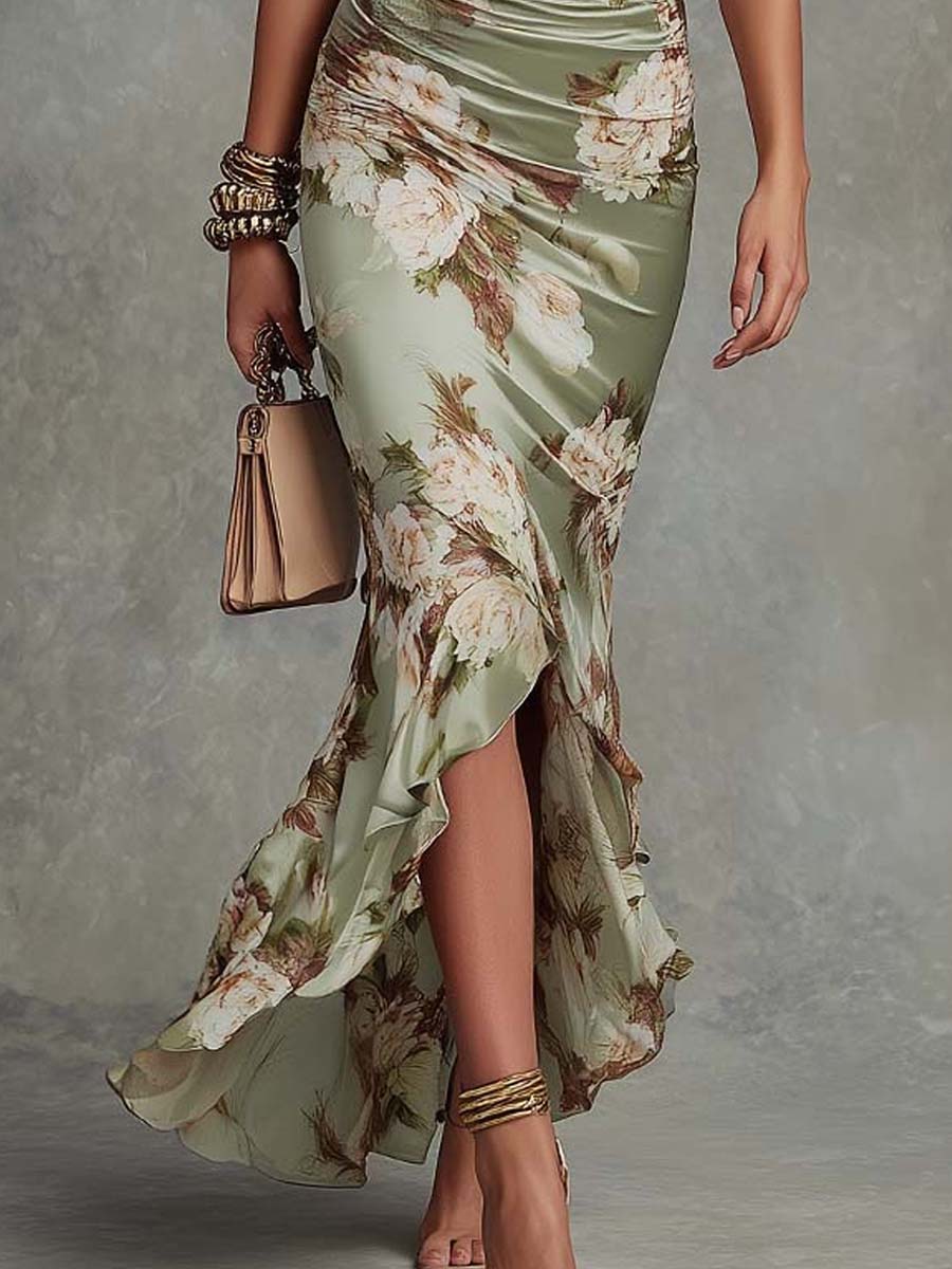 Anne | Robe longue asymétrique en satin vert à col en V, manches bouffantes et imprimé floral