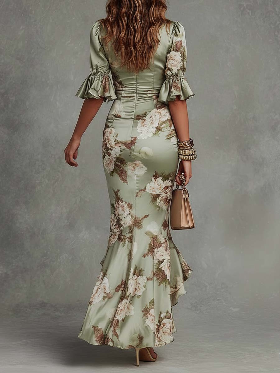 Anne | Robe longue asymétrique en satin vert à col en V, manches bouffantes et imprimé floral